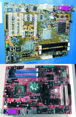 Рис. 3. Платы ASUS и ABIT на чипсетах 925X и 915P.